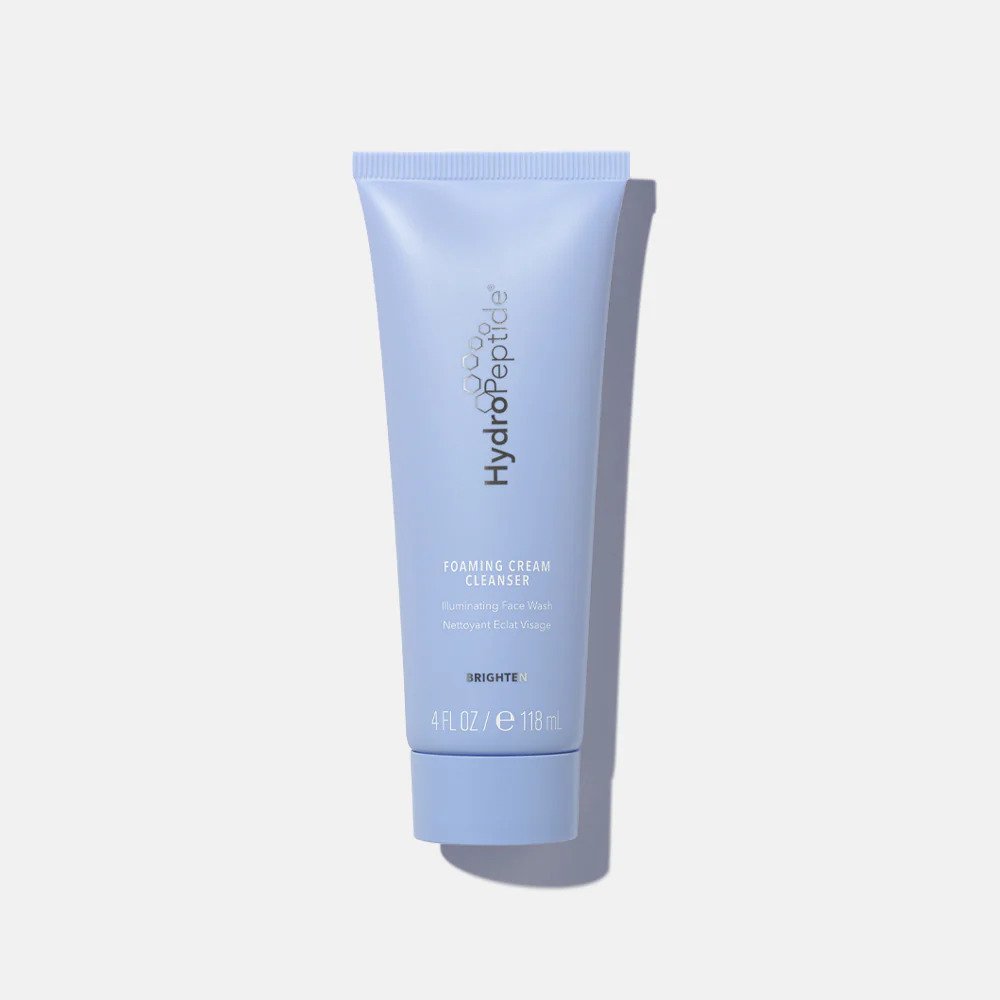 Foaming Cream Cleanser with amino acids, tranexamic acid, and niacinamide for gentle exfoliation, hydration, and a radiant, brightened complexion.